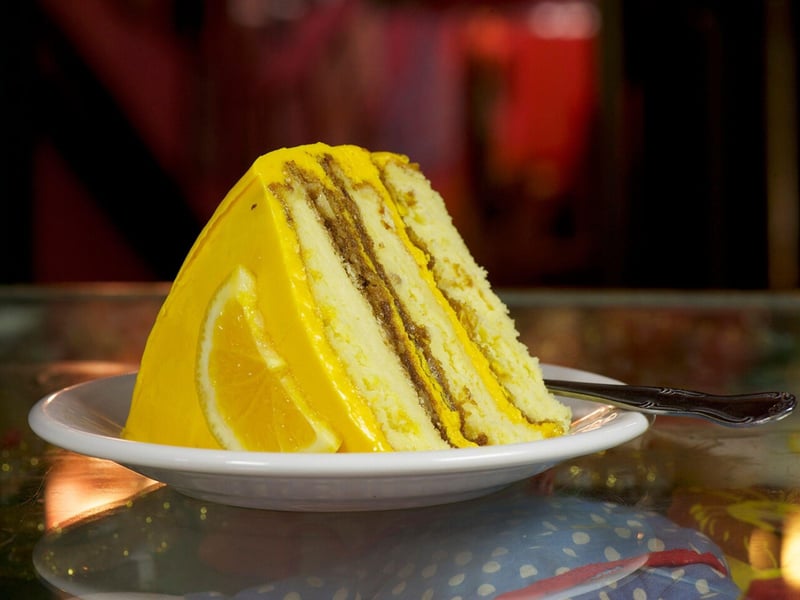 A slice of orange crunch cake