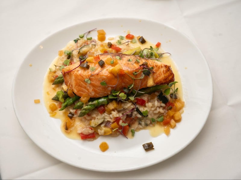 Cedar plank salmon with vegetable risotto
