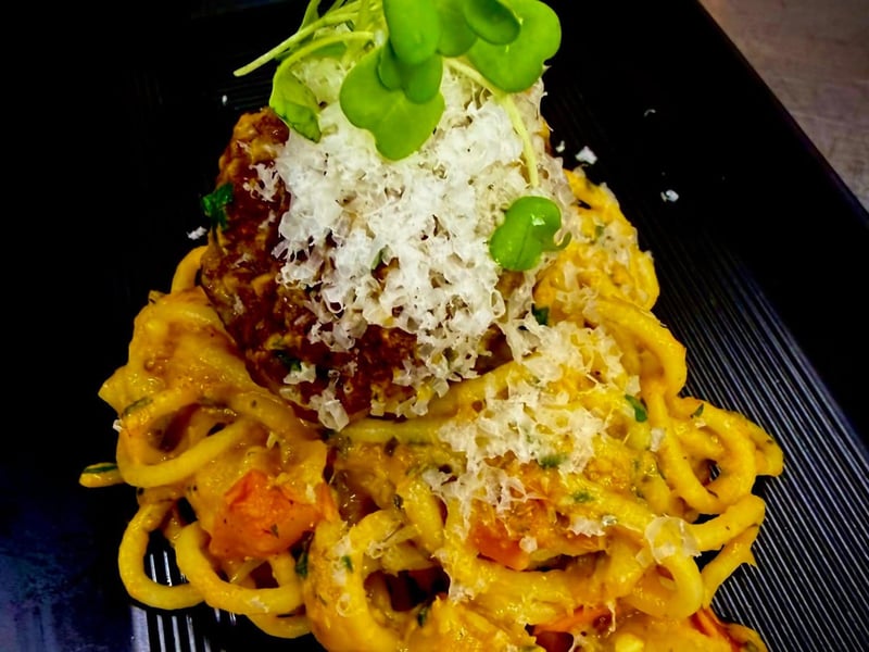 Polpette al Sugo on housemade semolina pasta