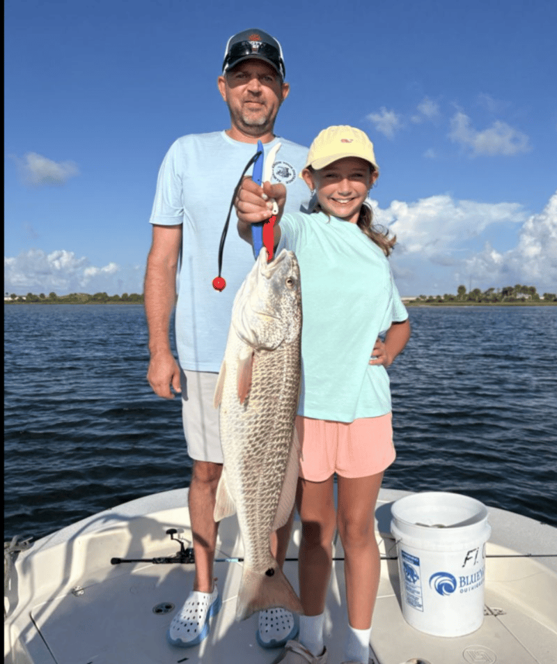 1390108 Father Daughter Redfish Catch Of The Day