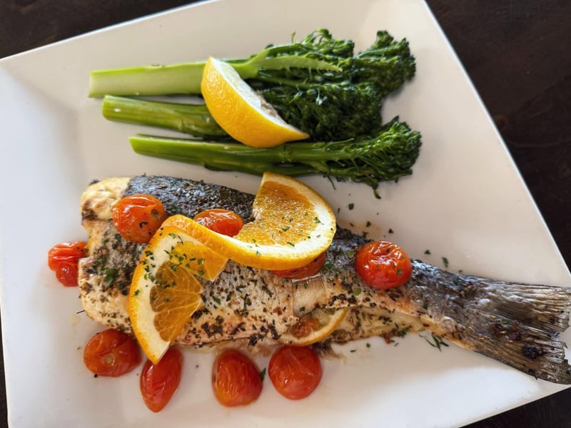 Whole roasted Branzino with sauteed broccolini