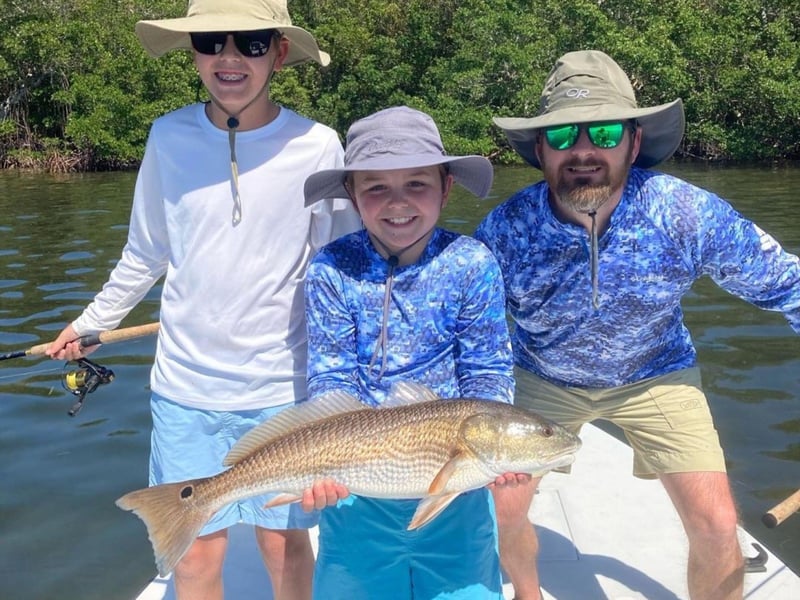 A family on the back of the boat