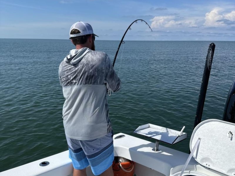 A guest fishing with Gulf Coast Charter Service