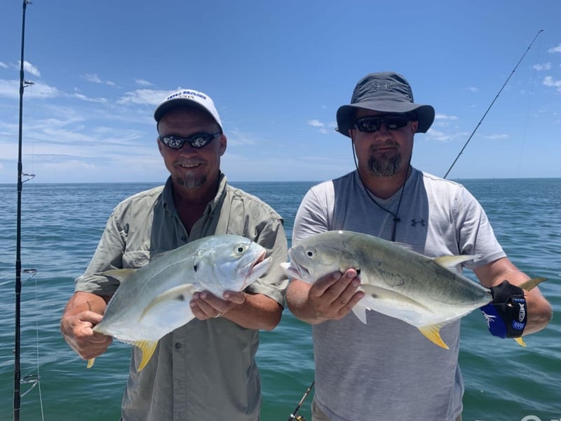 Two guests with their catches