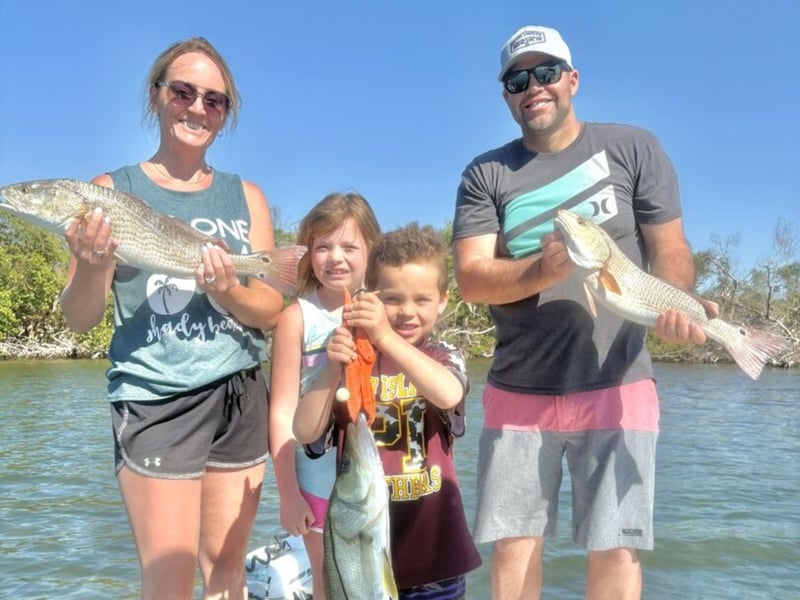 A family with Floridaze Fishing Charters