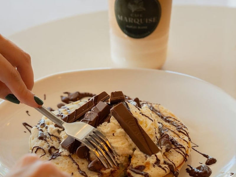 The menu features fresh crepes and pancakes
