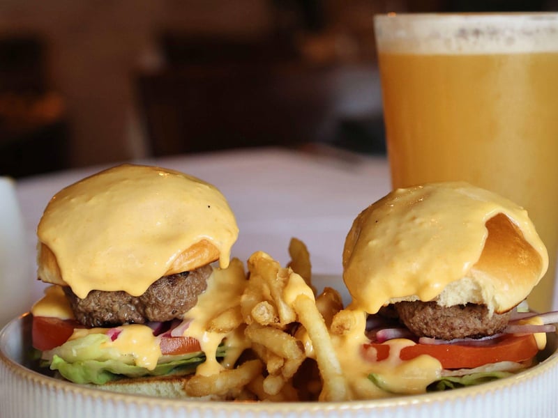 Two sliders with fries