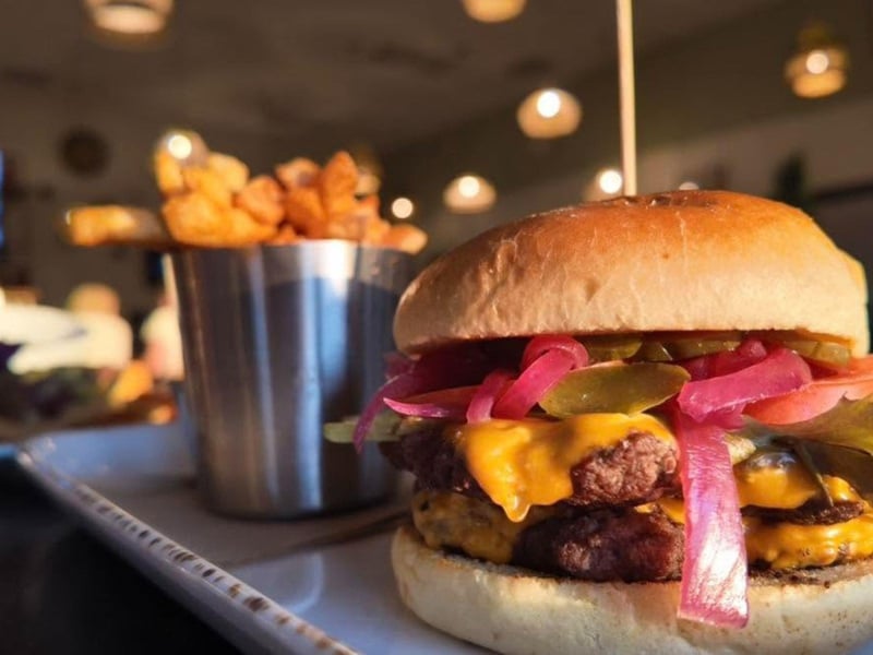A double cheeseburger with fries