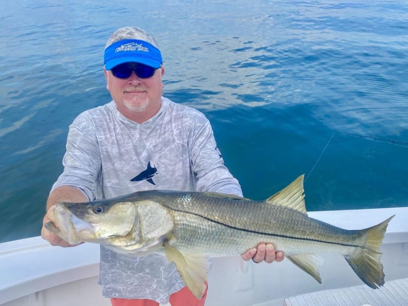 A guest showing off his catch