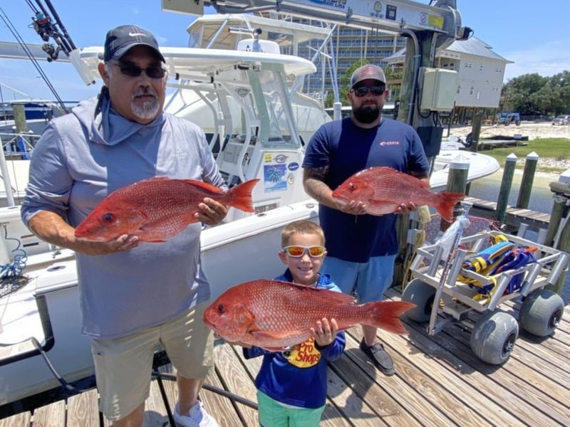 A family at the dock in Perdido Key, Florida