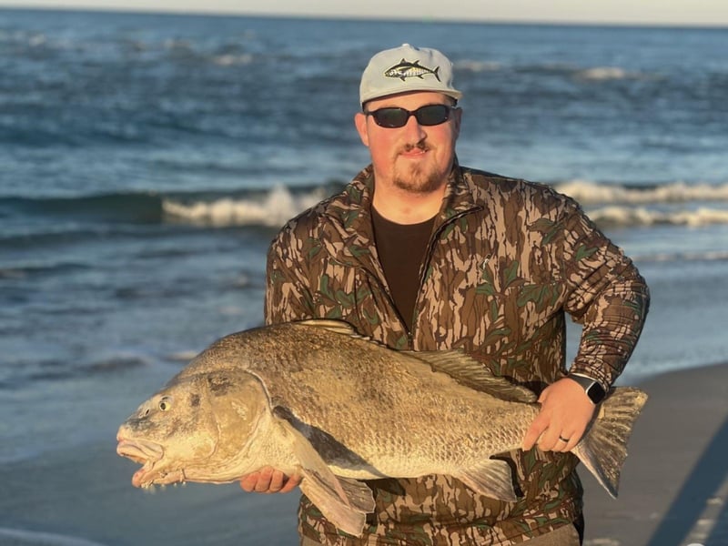 A guest showing off his catch