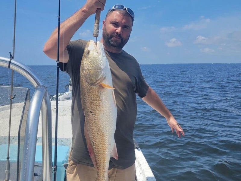 A guest with his fish on board