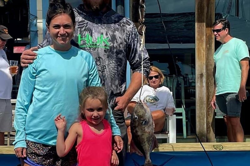 A family on the dock in Destin, Florida