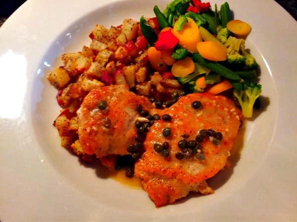 Chicken picatta with green and yellow mixed vegetables at Vinnie Rs in Navarre