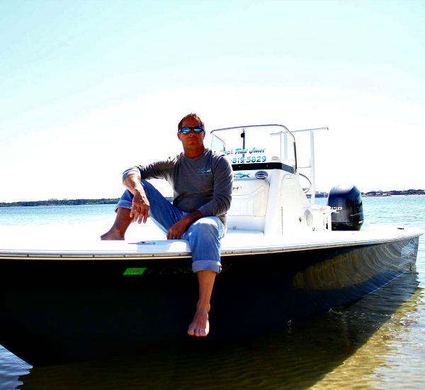 Captain Todd Jones of Back Bay Adventures in Panama City Beach sits aboard his fishing charter boat.