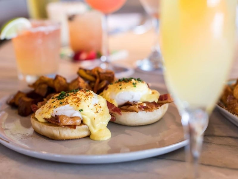An eggs benedict from Fish Out of Water at WaterColor Beach