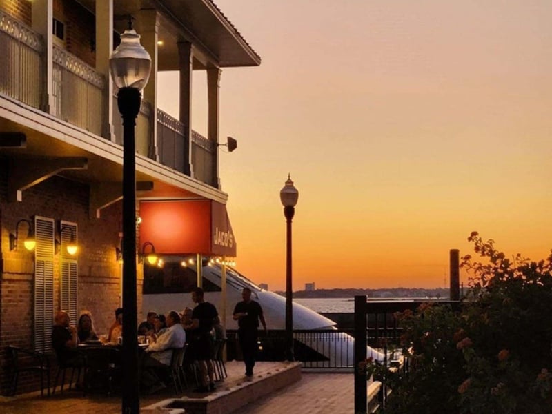 View of the bay at sunset at Jacos Bayfront Bar  Grille