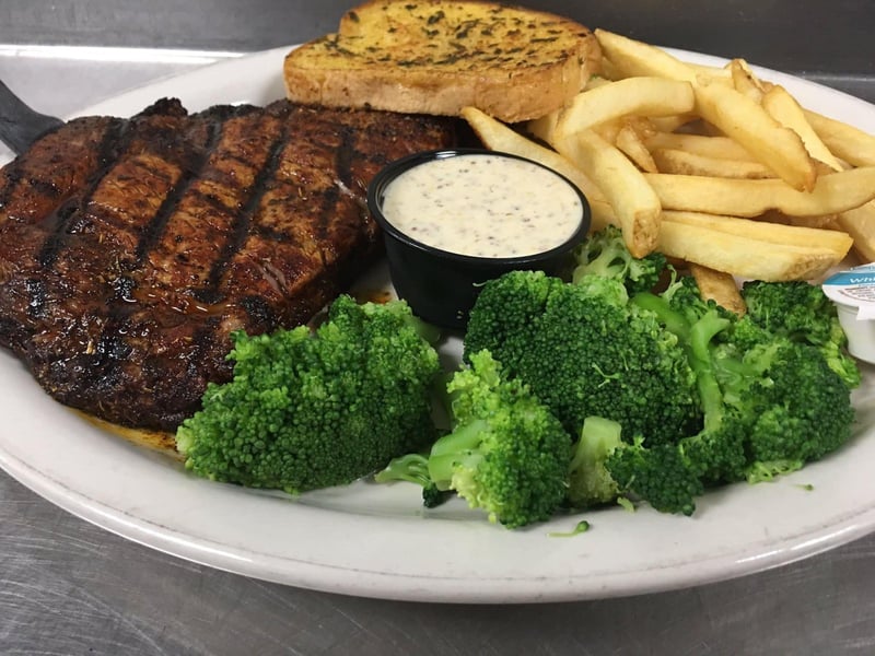 A steak and fries at Sidelines Sports Bar and Restaurant
