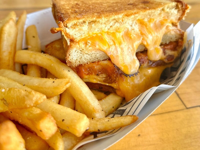 A grilled cheese and fries from History Class Brewing Company