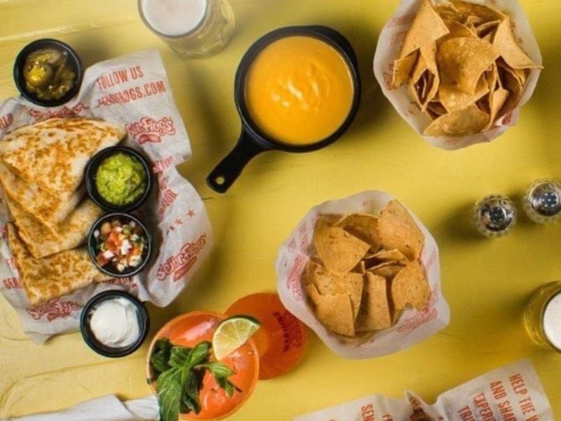 A table with dishes from Senor Frogs in Panama City Beach, Florida