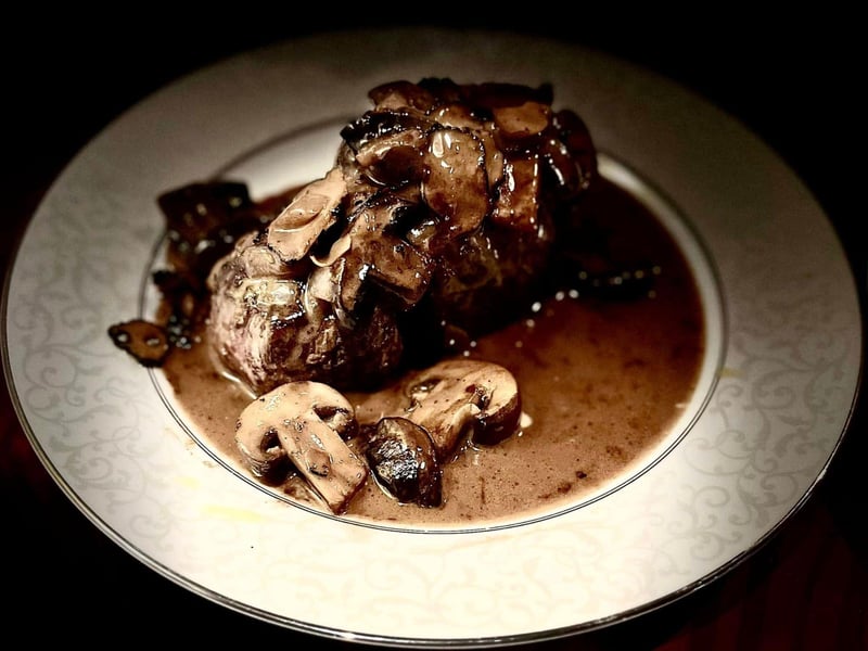 A meat and mushroom dish from Flambe After Dark in Fort Walton Beach, Florida