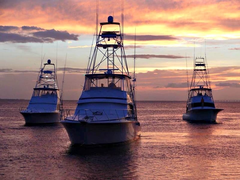 59024 Destinfishingrodeo3boatsatsunsetphotocourtesyofbeonthecoast
