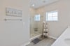 Primary bath has big spalike shower.