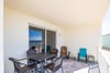 Grande sized patio overlooks marina.