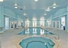 Indoor pool house includes heated pool, hot tub, sauna and fitness center