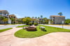 Neighborhood fire pit, benches and sidewalks..