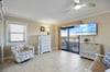Master bedroom with private balcony.