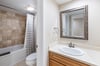 Primary bath with convenient tub shower combo.
