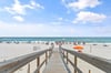 Private Boardwalk to a world class beach.