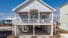 Charming dogfriendly coastal cottage with private deck and easy access to the sugarwhite sands