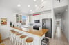 Wellstocked kitchen with modern appliances and plenty of counter space for cooking at home