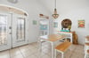Relaxed coastal living space with easy flow into the kitchen and dining areas
