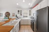 Wellstocked kitchen with modern appliances and plenty of counter space for cooking at home