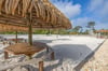 Sand volleyball court just off the pool deck—fun for families and groups looking to stay active