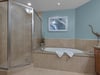 Large Primary bath with walk in shower and jacuzzi tub