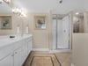 Primary bath with walk in shower and jacuzzi tub