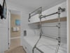 Unique bunk area with double bed on the bottom and twin on top
