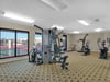 Fitness center overlooking tennis courts