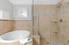 Primary Bathroom with Tub and Walk In Shower