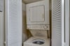 Stackable Washer and Dryer in Hall Bathroom