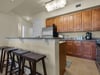 Kitchen with additional breakfast bar seating