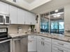 Kitchen with View to the Screened Porch