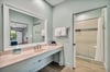 Large vanity counter and bathroom with walkin shower