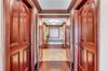 Custom Cherry Closets in Primary Bedroom