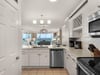 Open Kitchen with Stainless Steel Appliances