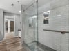 Double Walkin Shower with Dual Rainfall Showerheads in Primary Bathroom